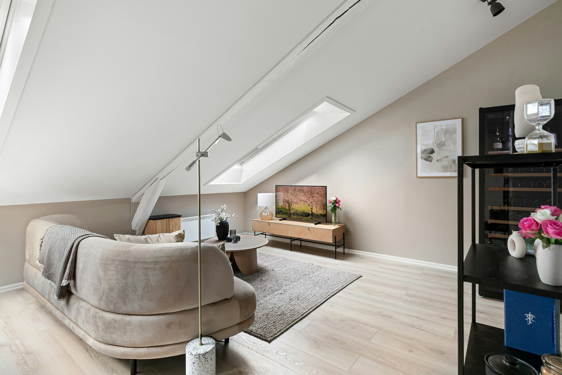 bright studio apartment with natural light and half wall divider