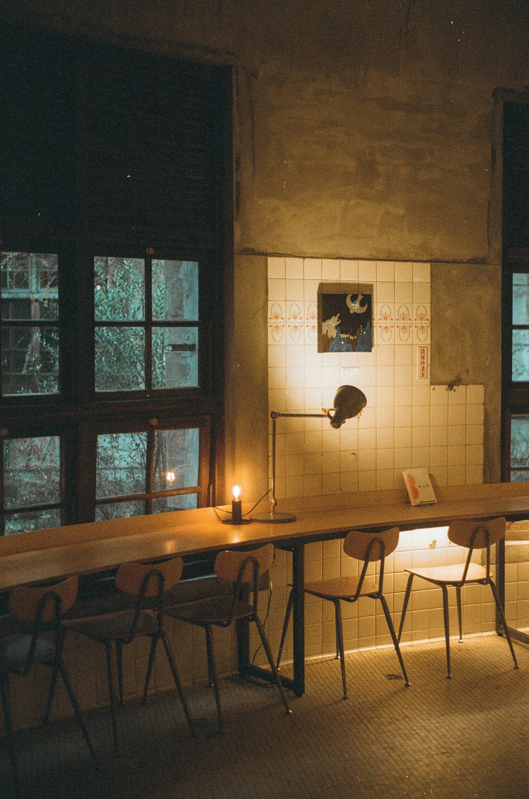 low-profile studio layout with industrial dining area